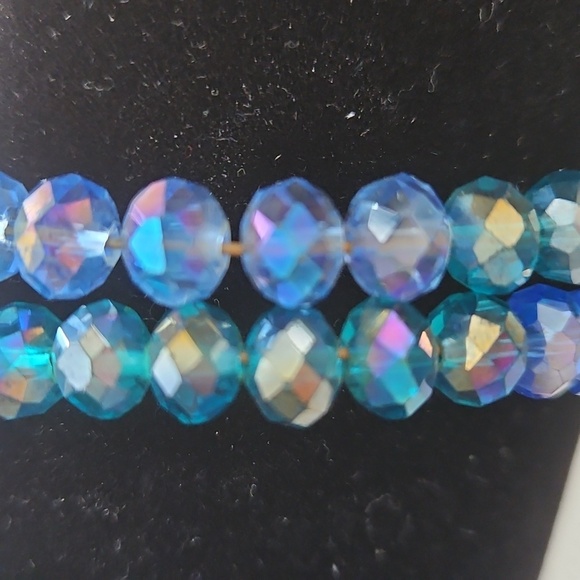 CRYSTAL AB LIGHT BLUE & MEDIUM BLUE Beads on Wire Bracelet. 2 1/2" Dia. - Picture 2 of 6